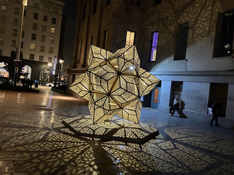 aurum sculpture at night